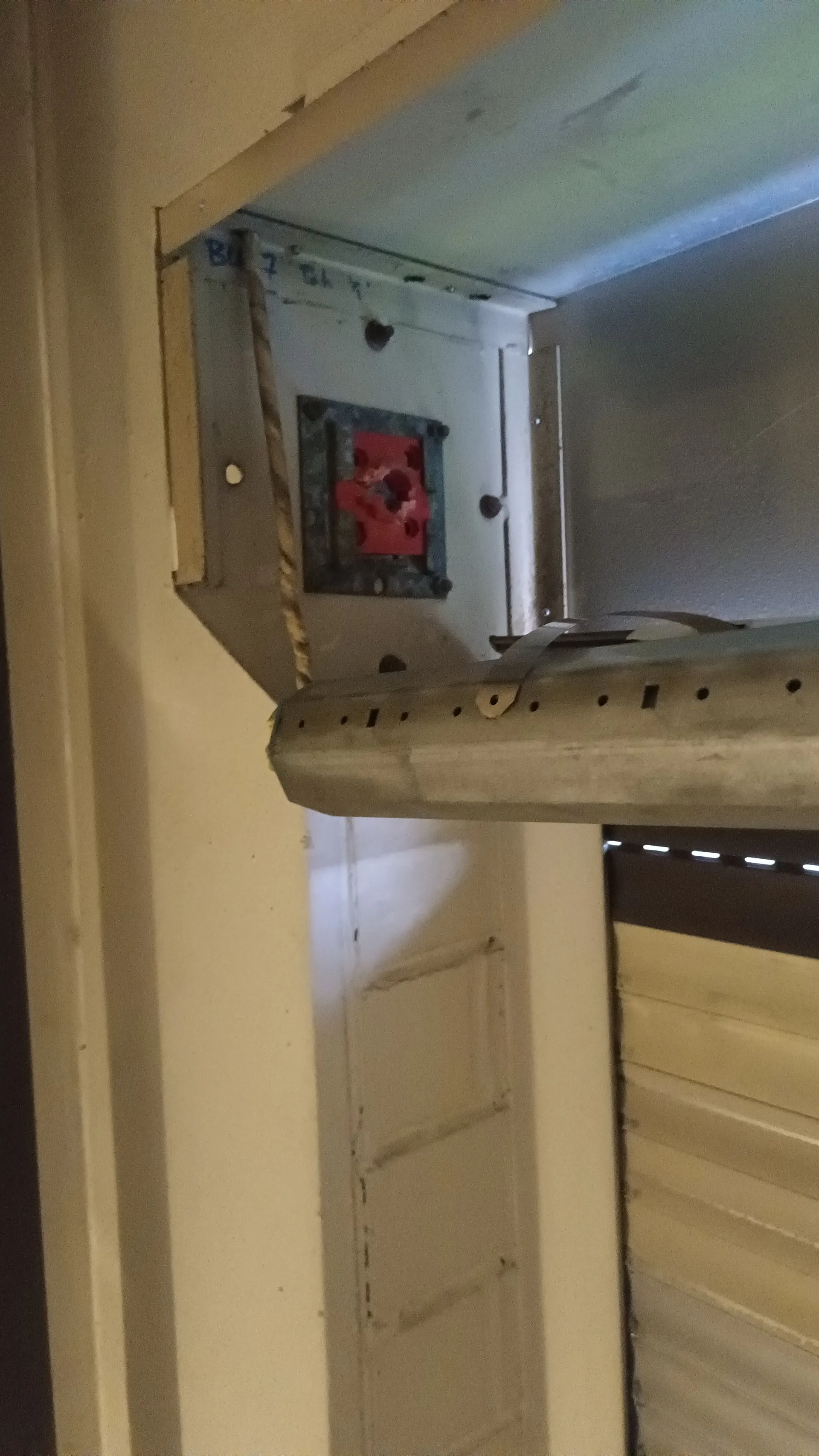 Shutter is broken on one side.