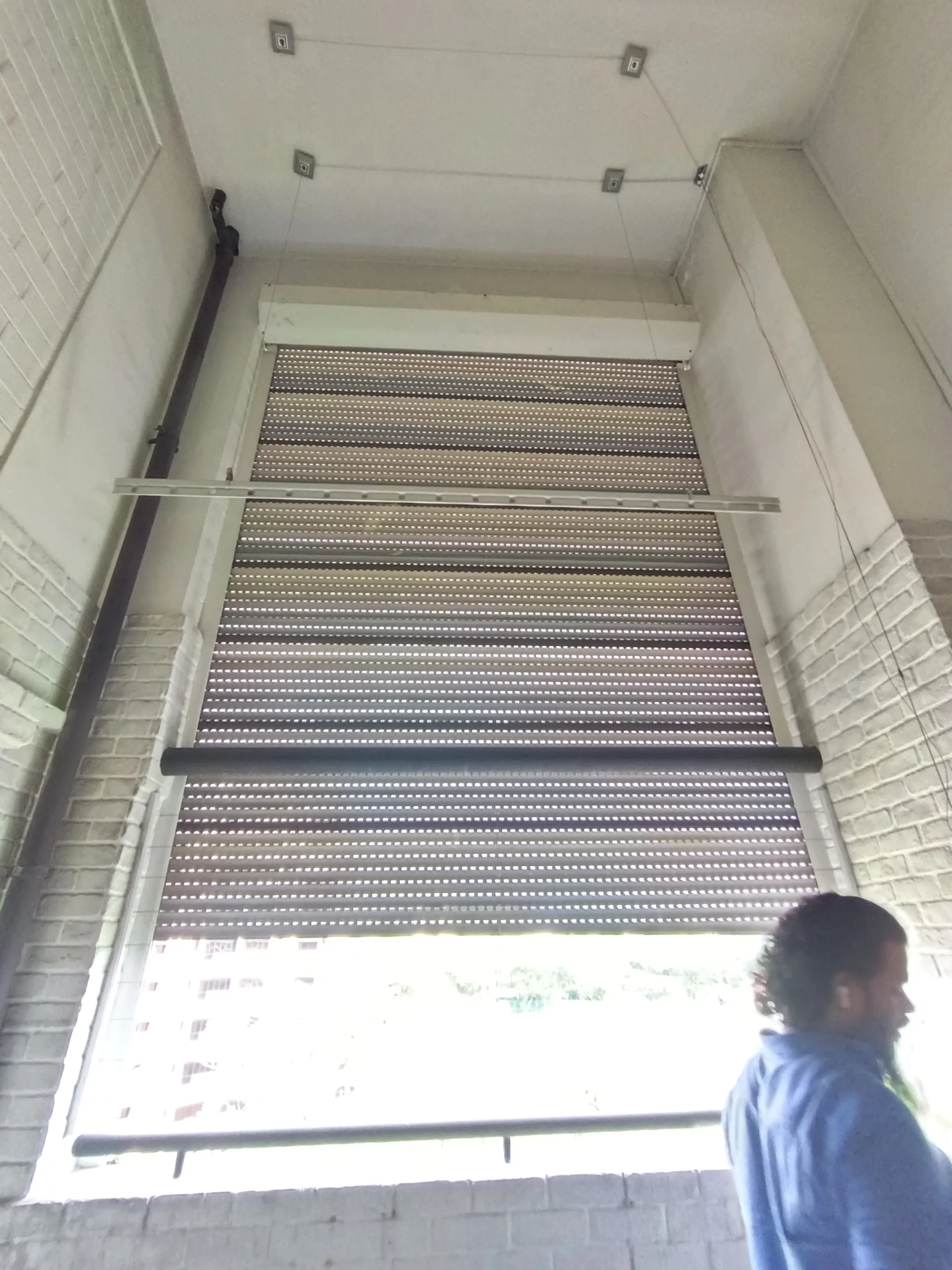 Shutter is broken on one side.