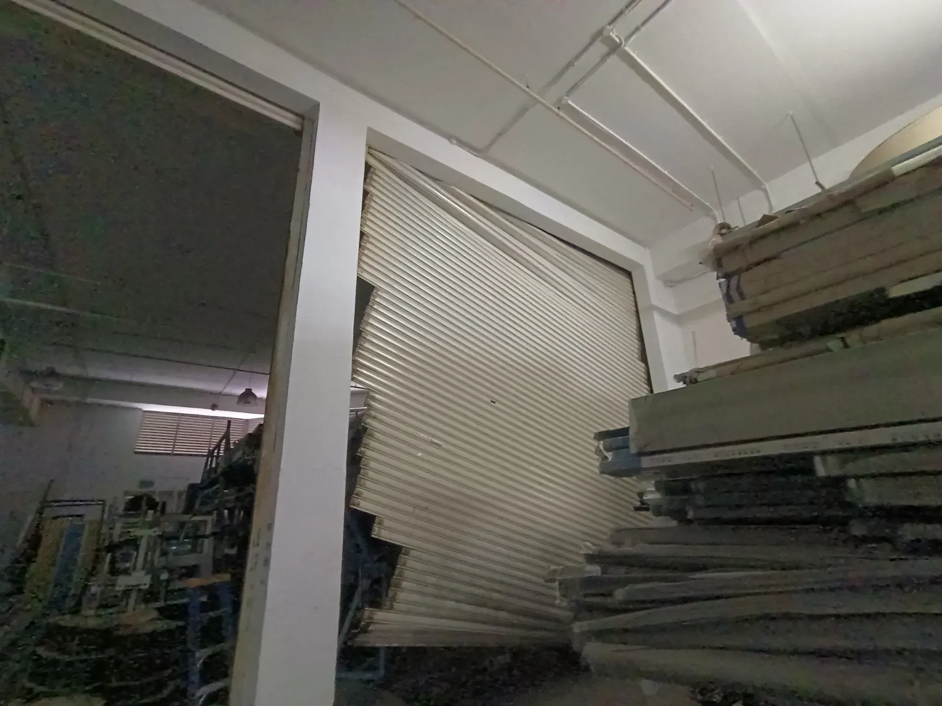 Emergency Off-Track Damaged Roller Shutter Slats Repair & Realignment in Singapore Project Image in Singapore - Roller Shutter Specialist