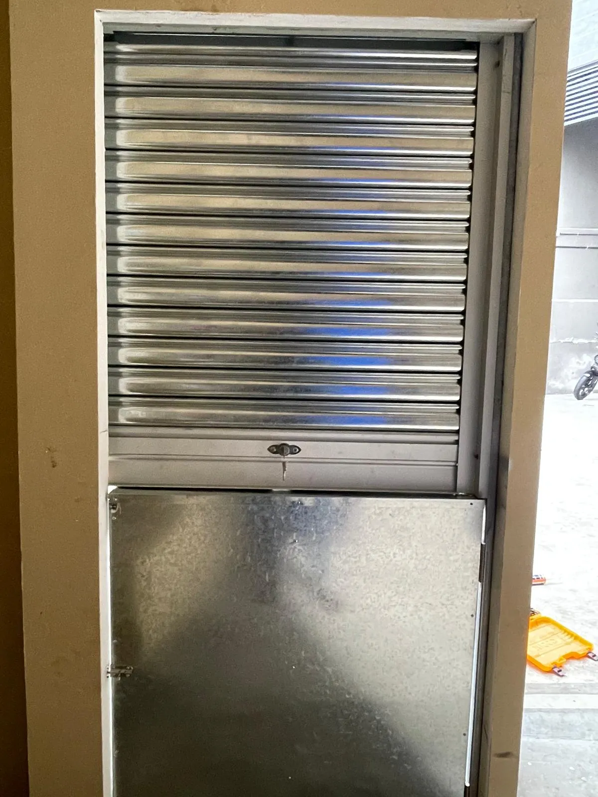 Manual Roller Shutter & Integrated Delivery Counter Installation at Mohamed Sultan Road - Roller Shutter Project in Singapore