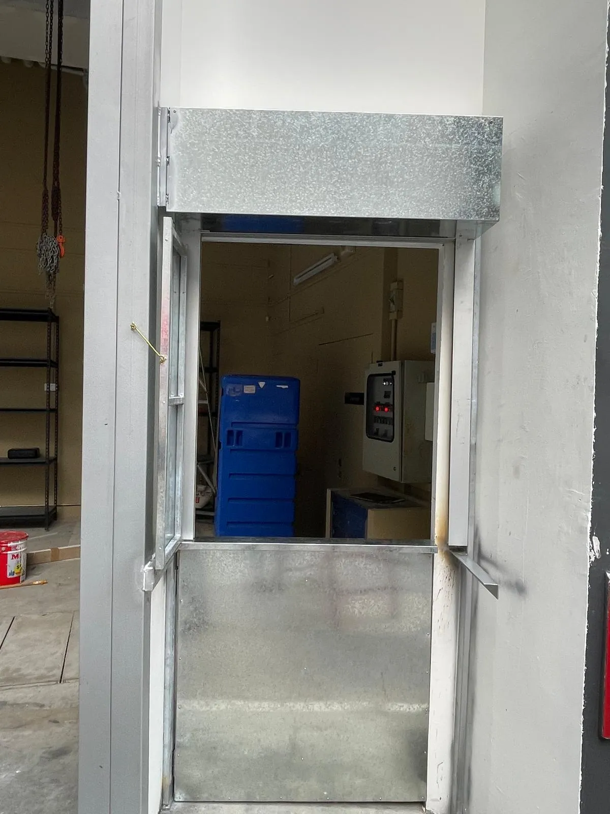 Manual Roller Shutter & Integrated Delivery Counter Installation at Mohamed Sultan Road - Roller Shutter Project in Singapore