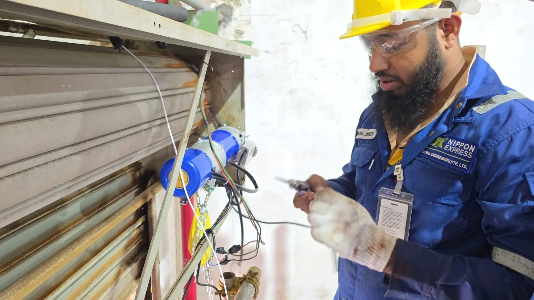 Roller Shutter Motor Replacement & Drive Unit Calibration in Singapore Roller Shutter Project in Singapore - HTR Engineering