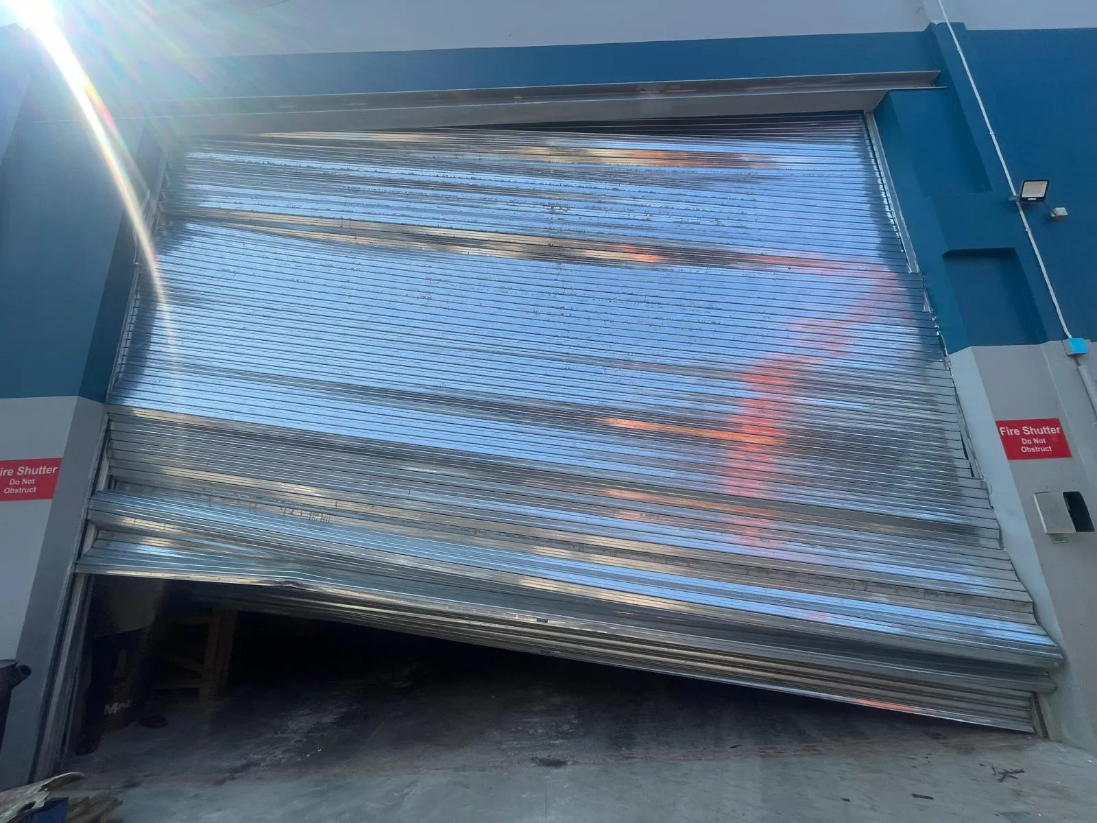 Retail Shopfront Roller Shutter Slat Replacement & Realignment in Singapore Roller Shutter Project in Singapore - HTR Engineering